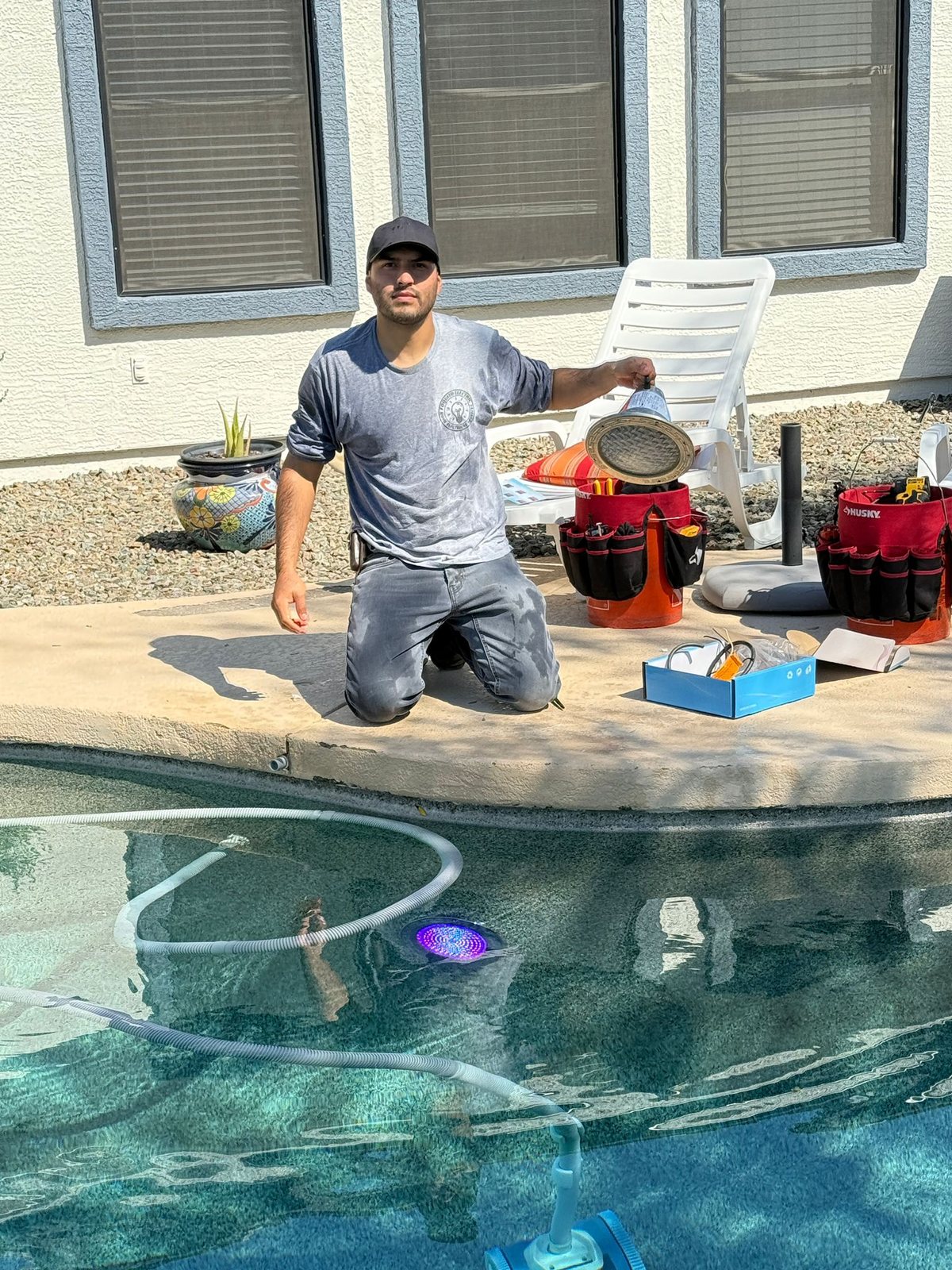 Foquito Electric performing residential pool lighting service